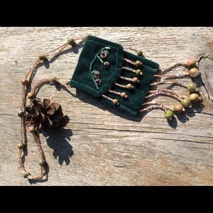 Hand sewn and beaded decorative mini purse.